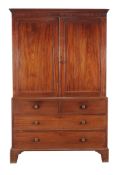 A George III mahogany clothes press, early 19th century, 205cm high, 130cm wide, 60cm deep