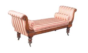 A mid-Victorian window seat , circa 1860, with outscrolled rests above the removable seat, and on