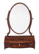 Ω A George III mahogany and ivory mounted platform dressing mirror , circa 1800, of bowfront