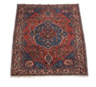 Two Tabriz rugs, measuring approximately 104 x 151 cm and approximately 159 x 202 cm respectively