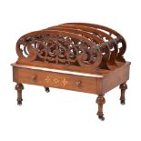 A mid Victorian walnut Canterbury , circa 1870, the openwork scrolled dividers above a single