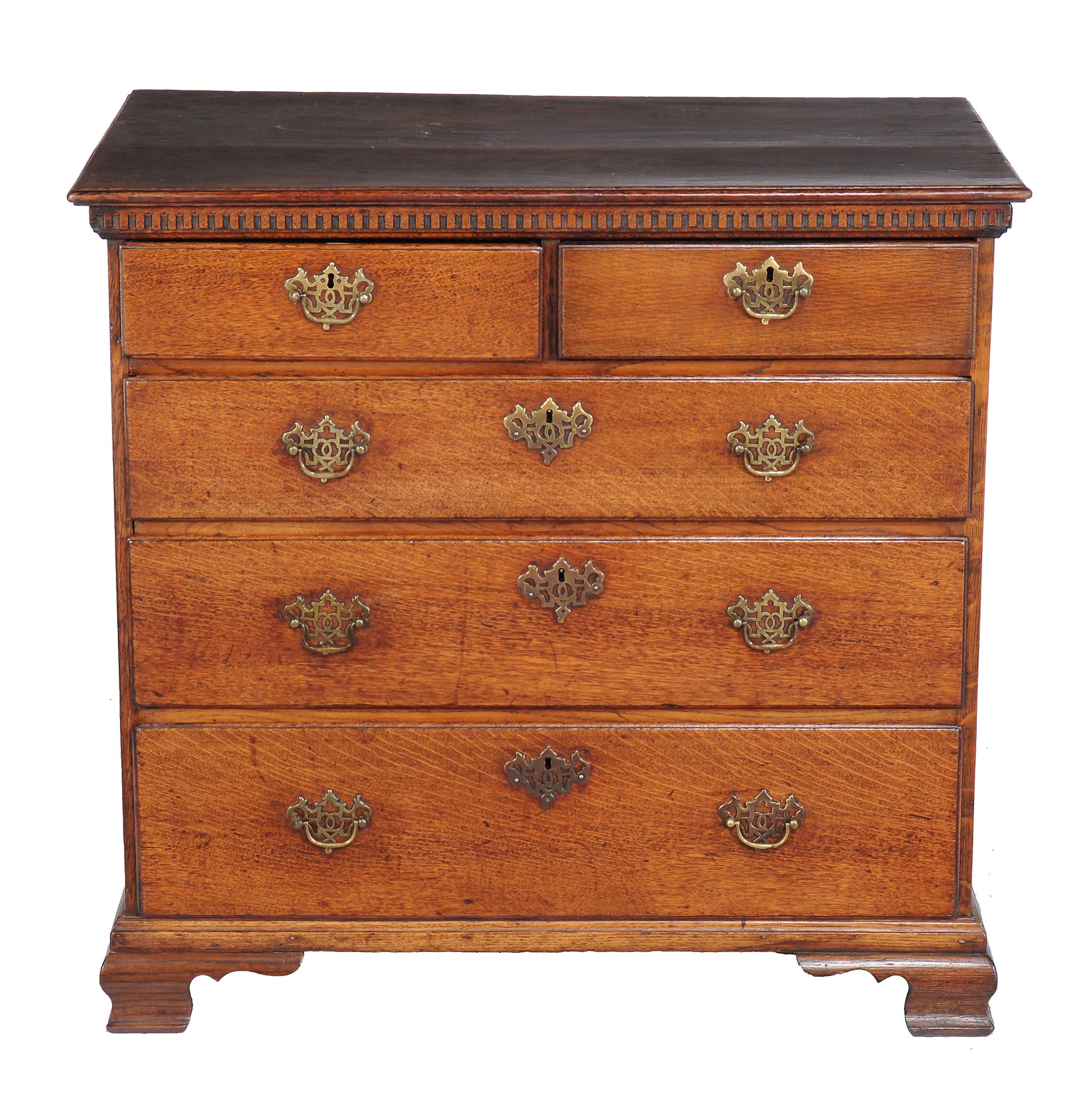 A George III oak chest of drawers , circa 1770, with dentil cornice above two short and three long