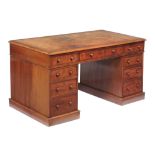 A Victorian mahogany twin pedestal desk , late 19th century, with leather inset top and three