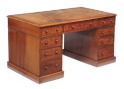 A Victorian mahogany twin pedestal desk , late 19th century, with leather inset top and three