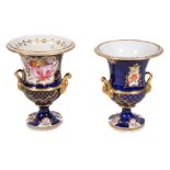 Two similar Coalport blue-scale ground campagna urns , circa 1820, each painted with panels of