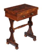 Ω An early Victorian rosewood games table , circa 1840, the hinged rectangular top opening to a