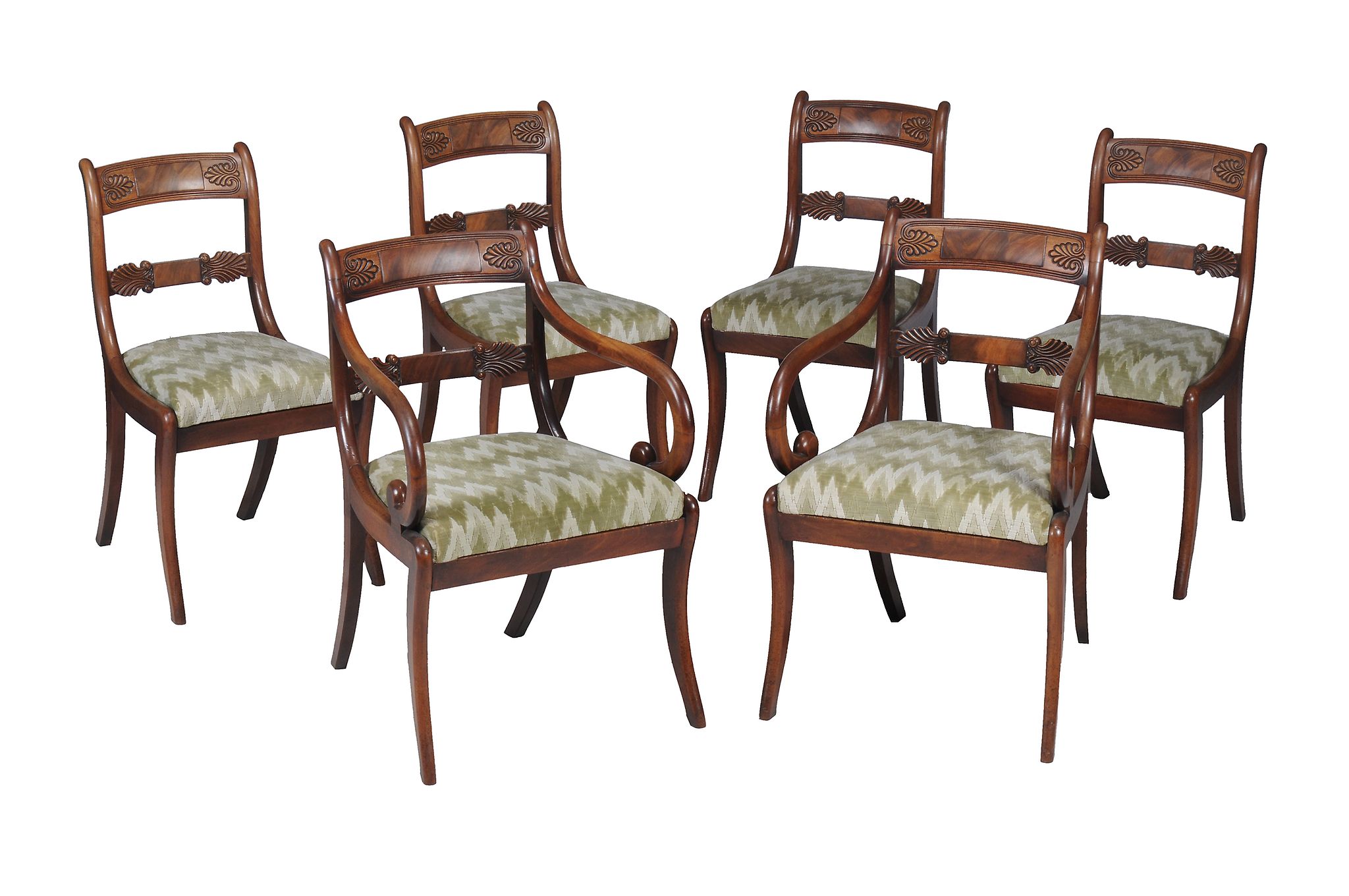 A set of six late Regency mahogany dining chairs, circa 1820, to include a pair of armchairs, each