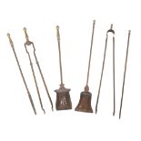 A set of three steel and brass mounted fire tools , 19th century, comprising shovel, poker and
