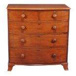 A mahogany chest of drawers, first half 19th century, of bowfront outline, 103cm high, 101cm wide,