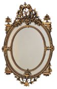 A black painted and parcel gilt wall mirror , late 19th/early 20th century, 165cm high, 110cm wide