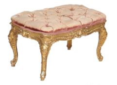 A Victorian carved giltwood and velvet button upholstered stool , circa 1870, 43cm high, the seat