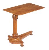 A Victorian pitch pine reading table , circa 1875, the rectangular top with moulded edge on a