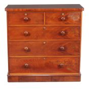 A Victorian mahogany chest of drawers, mid 19th century, each drawer with Bramah style escutcheon,