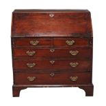 A George III mahogany bureau , circa 1780, the fall enclosing an inlaid fitted interior with