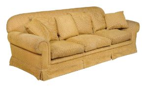A Kingcome three seat sofa, late 20th century, in yellow upholstery, with applied Kingcome Sofa's