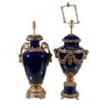 Two similar blue ceramic and gilt metal mounted table lamps , late 20th century, each with flanking