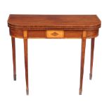 A George III mahogany and inlaid folding card table , circa 1790, 74cm high, 91cm wide, 43cm deep