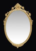 A Victorian giltwood and composition oval wall mirror , circa 1870, 76cm high, 49cm wide