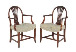 A pair of Edwardian mahogany carver chairs in George III style, circa 1905, each with an