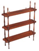 A flight of Victorian mahogany hanging wall shelves , mid 19th century, each shelf divided by
