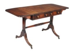 A mahogany sofa 'dressing' table , circa 1825 and later, the rectangular top with lifting section