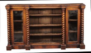 Ω A Victorian rosewood side cabinet , circa 1860, in the manner of Gillows, with barleytwist