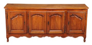 A Louis XV cherry dresser base , mid 18th century, with a central pair of shaped panel doors and