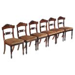 Ω A set of six William IV rosewood dining chairs, circa 1835, in the manner of Gillows Cites
