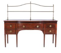 A mahogany and satinwood banded sideboard, 19th century, of break-bowfront outline, the rear brass