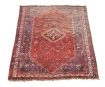 A Shiraz carpet , approximately 214cm x 312cm