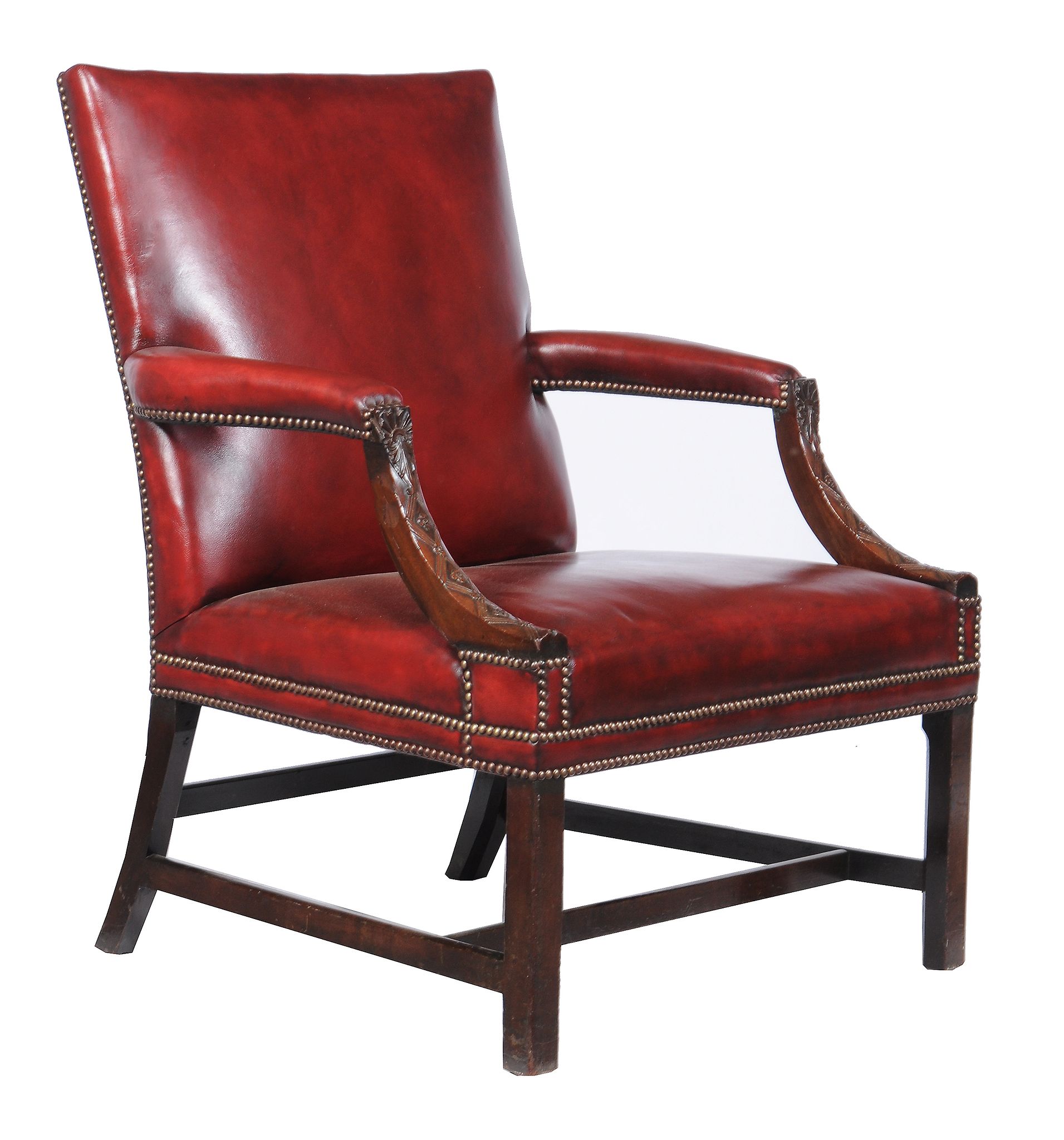 A mahogany and leather upholstered armchair, early 19th century and later, with carved lattice and