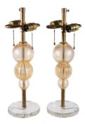 A pair of Italian table lamps, attributed to Venini, aventurine glass and brass, 55 cm high