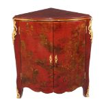 A red lacquered and gilt metal mounted corner cabinet in mid 18th century style , 20th century, of