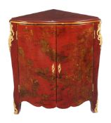 A red lacquered and gilt metal mounted corner cabinet in mid 18th century style , 20th century, of