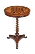 Ω A Victorian rosewood and specimen parquetry games table , circa 1860, probably colonial, the