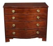 A George III mahogany chest of drawers , circa 1800, of serpentine outline, 97cm high, 115cm wide,