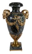A green serpentine marble and gilt metal mounted urn, 20th century, possibly previously a table