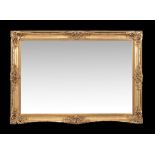 A gilt framed wall mirror, of recent manufacture, of very large proportion, 215cm high, 150cm wide