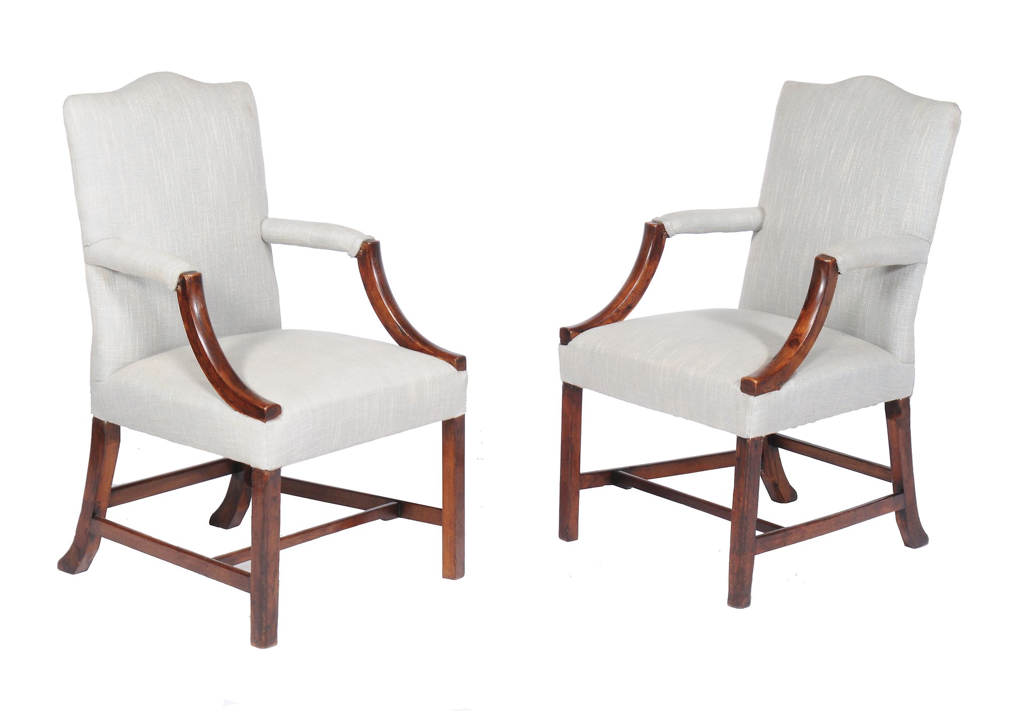 A pair of mahogany armchairs , late 18th century and later, of Gainsborough type, each recently