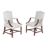 A pair of mahogany armchairs , late 18th century and later, of Gainsborough type, each recently