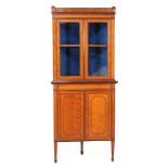 Ω An Edwardian satinwood and rosewood banded corner cabinet, circa 1905, 198cm high, 85cm wide
