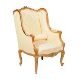 A giltwood and yellow damask upholstered armchair in Louis XVI style, early 20th century, 110cm