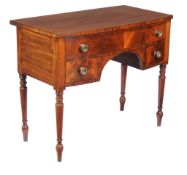 A George IV mahogany and line inlaid dressing table , circa 1825, 81cm high, 99cm wide, 54cm deep