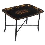 A black lacquer and parcel gilt painted metal tray table on a simulated bamboo stand , 19th