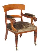 A William IV mahogany library armchair, circa 1835, the curved cresting rail and bar splat above