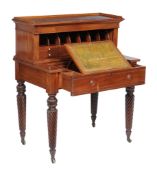 A William IV mahogany bonheur du jour , circa 1835, the superstructure with hinged fall enclosing