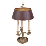 A French brass and tole peinte three light bouillotte lamp, late 19th century and later fitted for