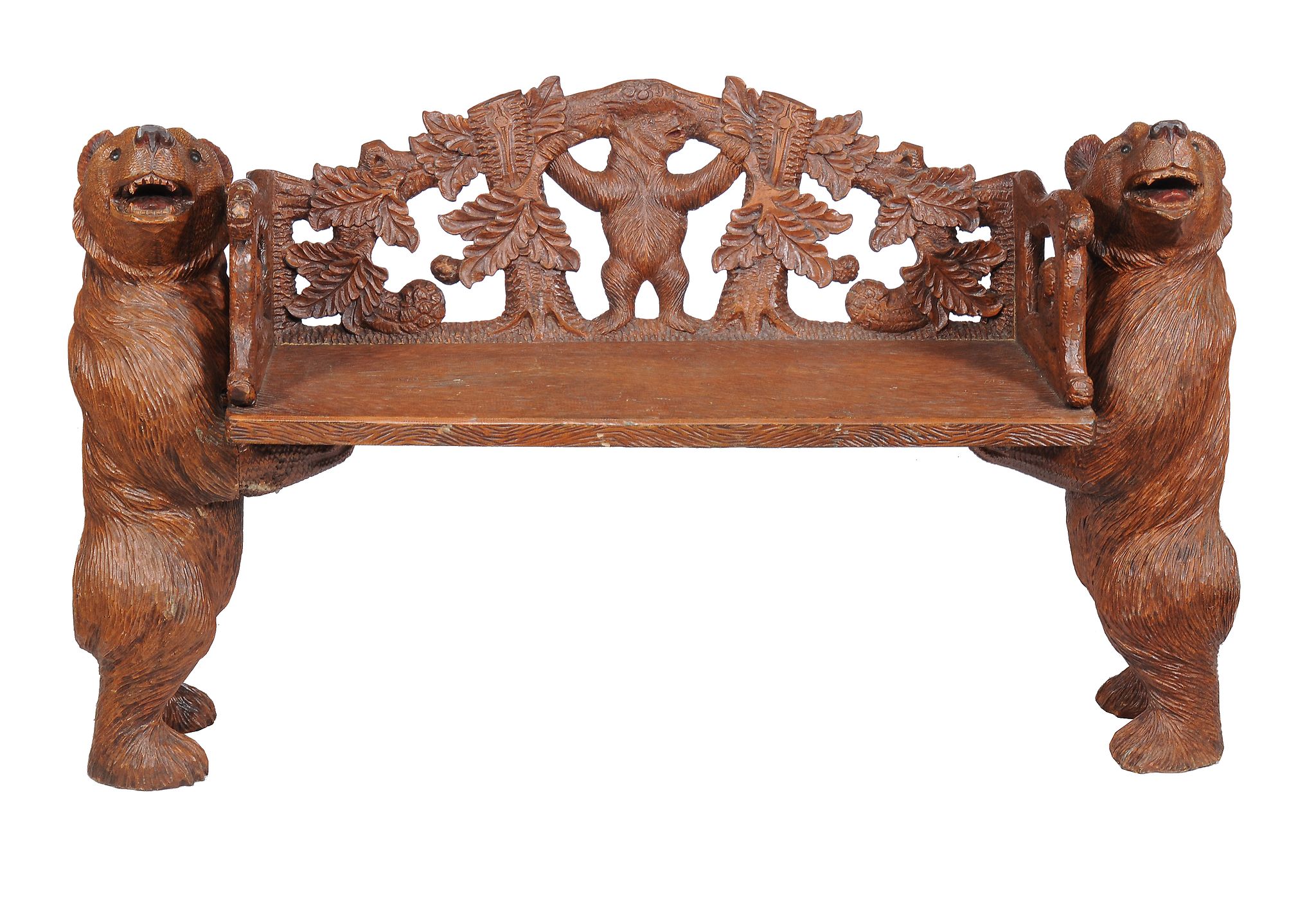 A carved wood hall seat, in the manner of Black Forest examples, 20th century, each end in the form - Image 2 of 3