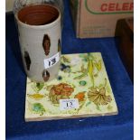 A Minton's pottery test tile for Barbotine colours, dated 1883 and a modern Studio pottery