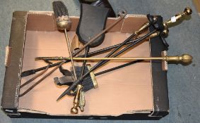 A small quantity of fire tools, including a modern black companion set, and two bed warming pans